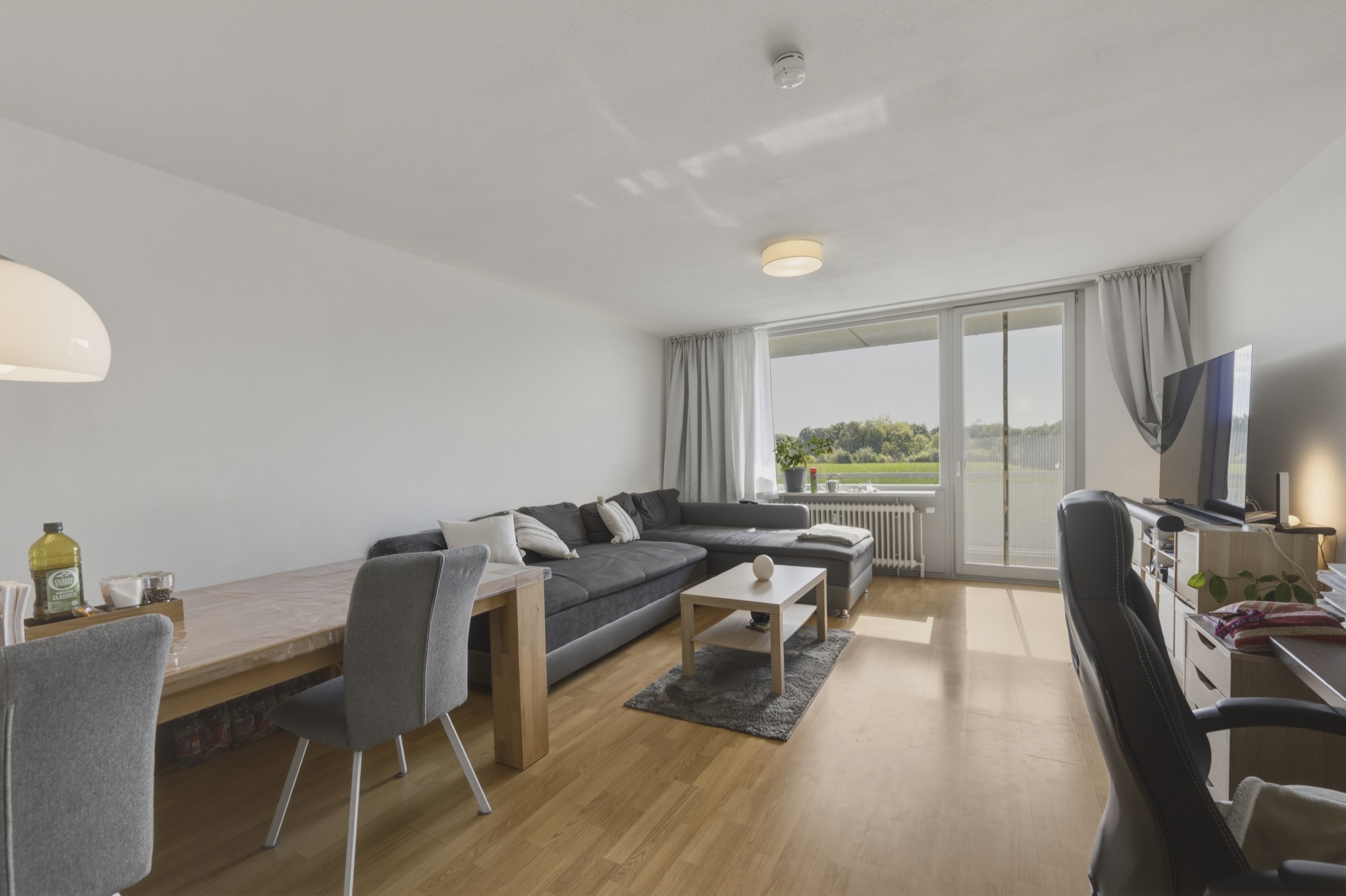 Wohnzimmer mit Blick ins Grüne, August-Macke-Weg, München-Thalkirchen – zum Verkauf